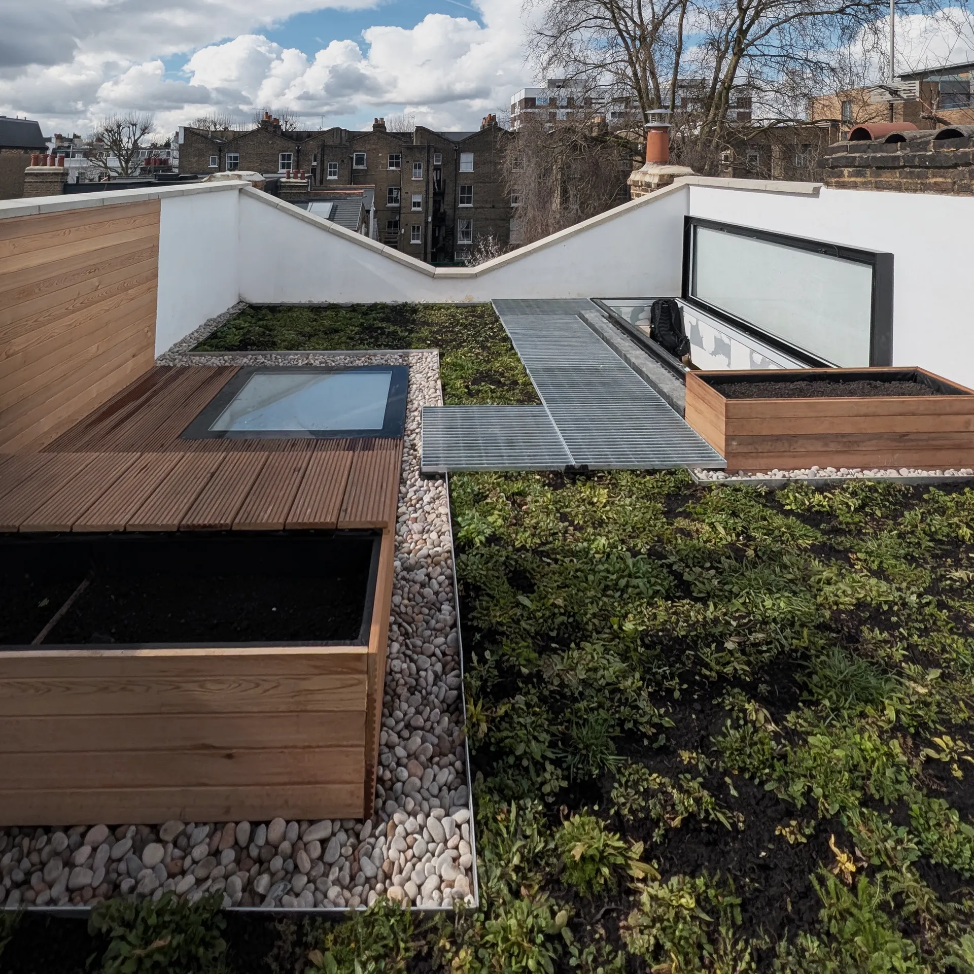 Roof Garden B — aerial view of rooftop garden with furniture and planting arrangement