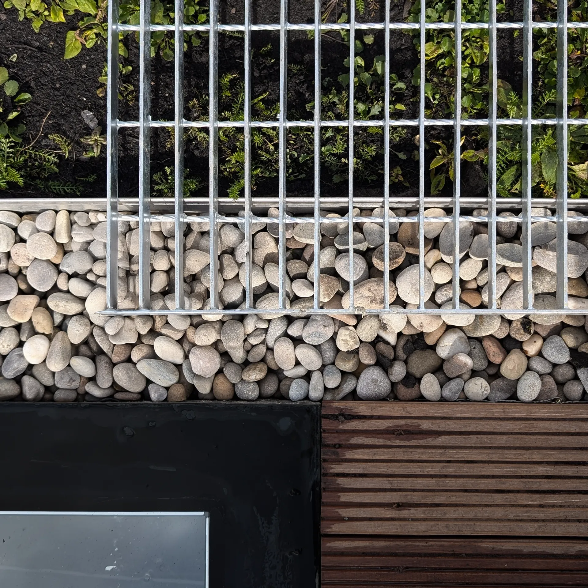 Landscape detail — close-up of planting and natural material palette
