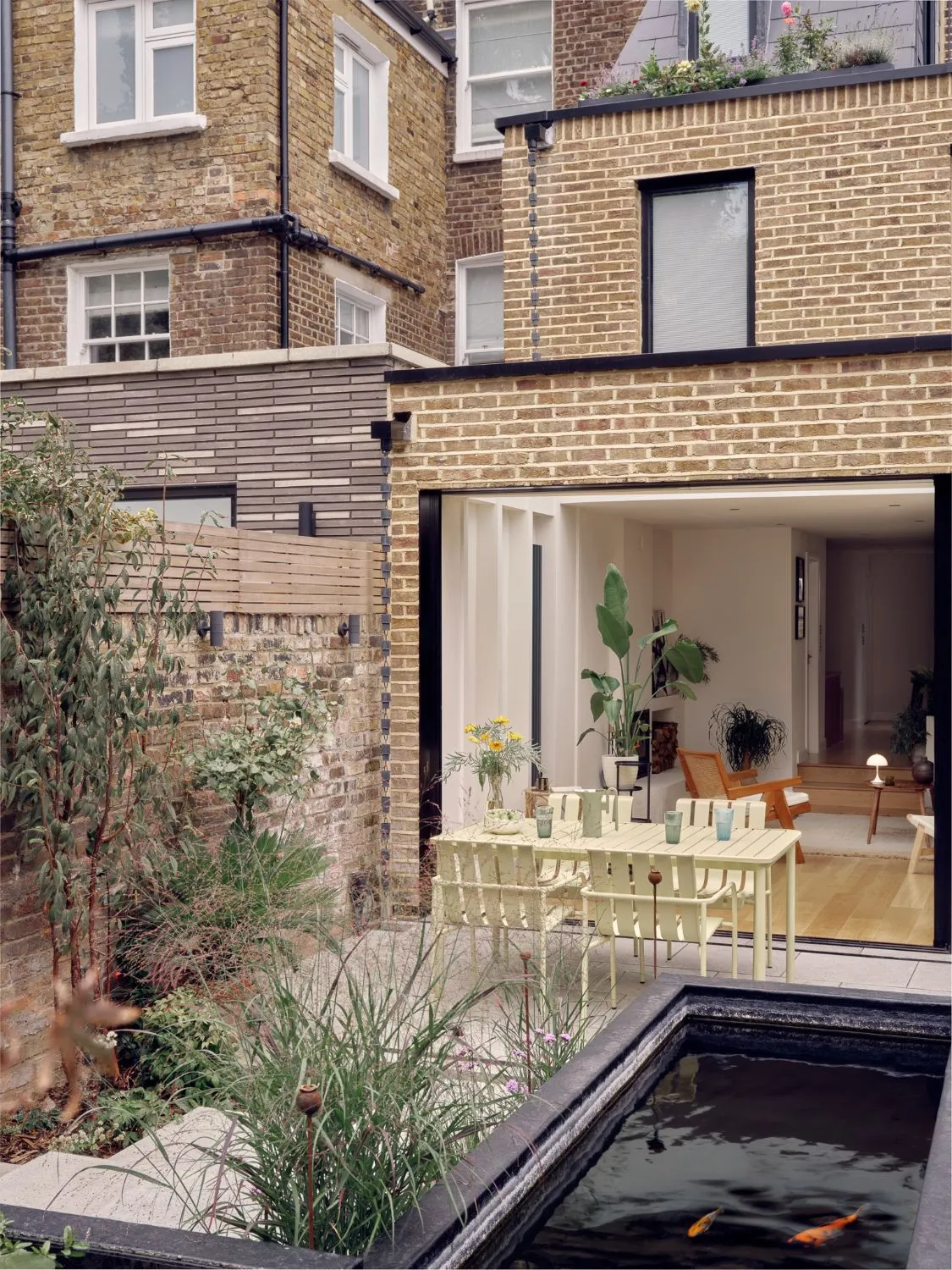 Rear Extension Brick Exterior with Garden and Koi Pond